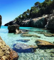 cala fustam beach menorca