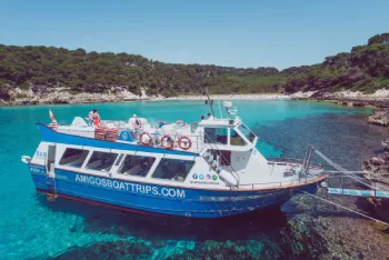 Half-day boat trip from Cala en Bosch to South beaches