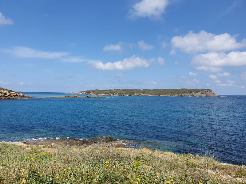 illa den colom es grau beach menorca
